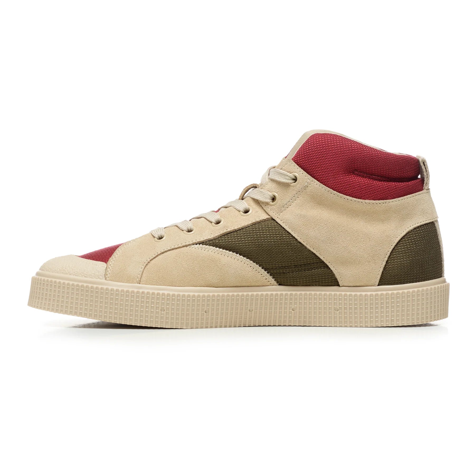 Side view of a Sanjo SK EVO high-top sneaker in a tan, red and green color block design. Features a combination of suede and canvas panels, with a white textured midsole and tonal laces. The ankle area includes a padded, breathable mesh collar for added comfort and support, creating a sleek and versatile look that merges sporty and casual style.