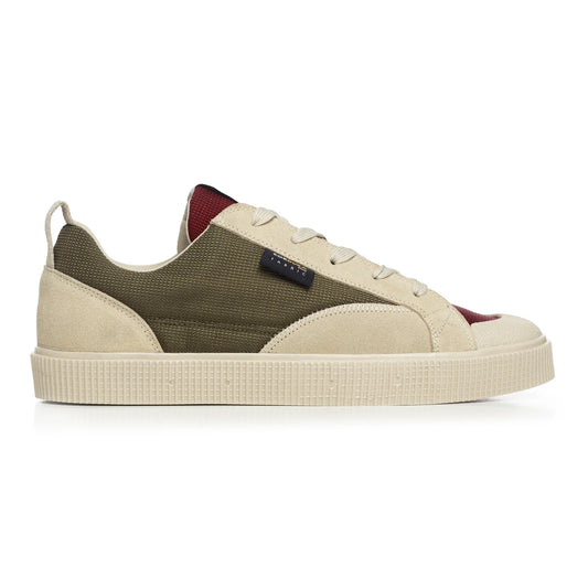 Side view of a Sanjo TESTE low-top sneaker in a tan, red and green color block design. Features a combination of suede and canvas panels, with a white textured midsole and tonal laces. The ankle area includes a padded, breathable mesh collar for added comfort and support, creating a sleek and versatile look that merges sporty and casual style.