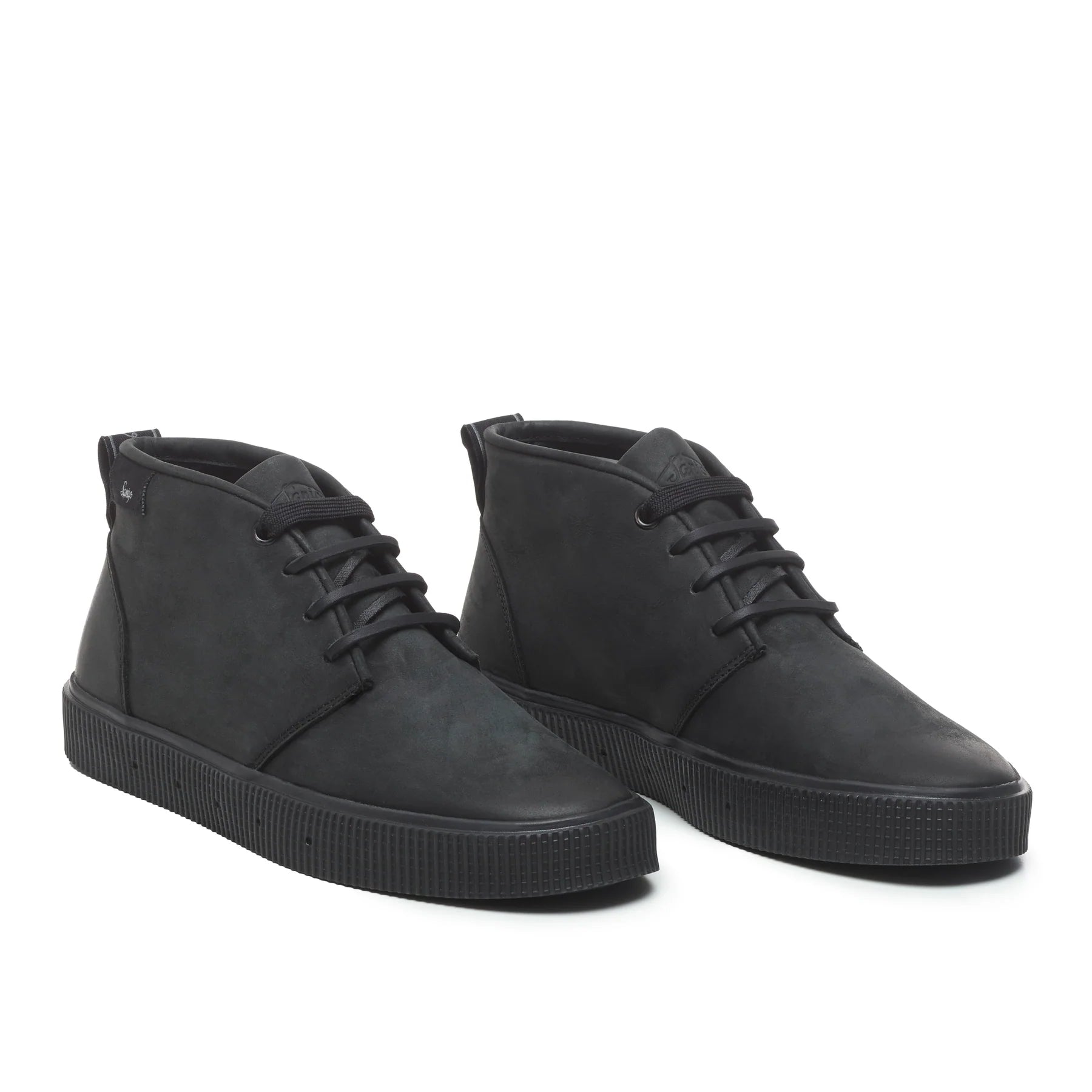 A pair of Sanjo mid-top leather desert boots in black with black laces and a durable rubber sole, styled with a sleek and versatile design.